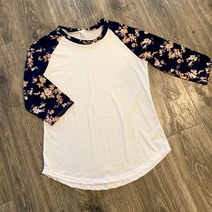 NWOT white raglan tee, with floral 3/4” sleeves.